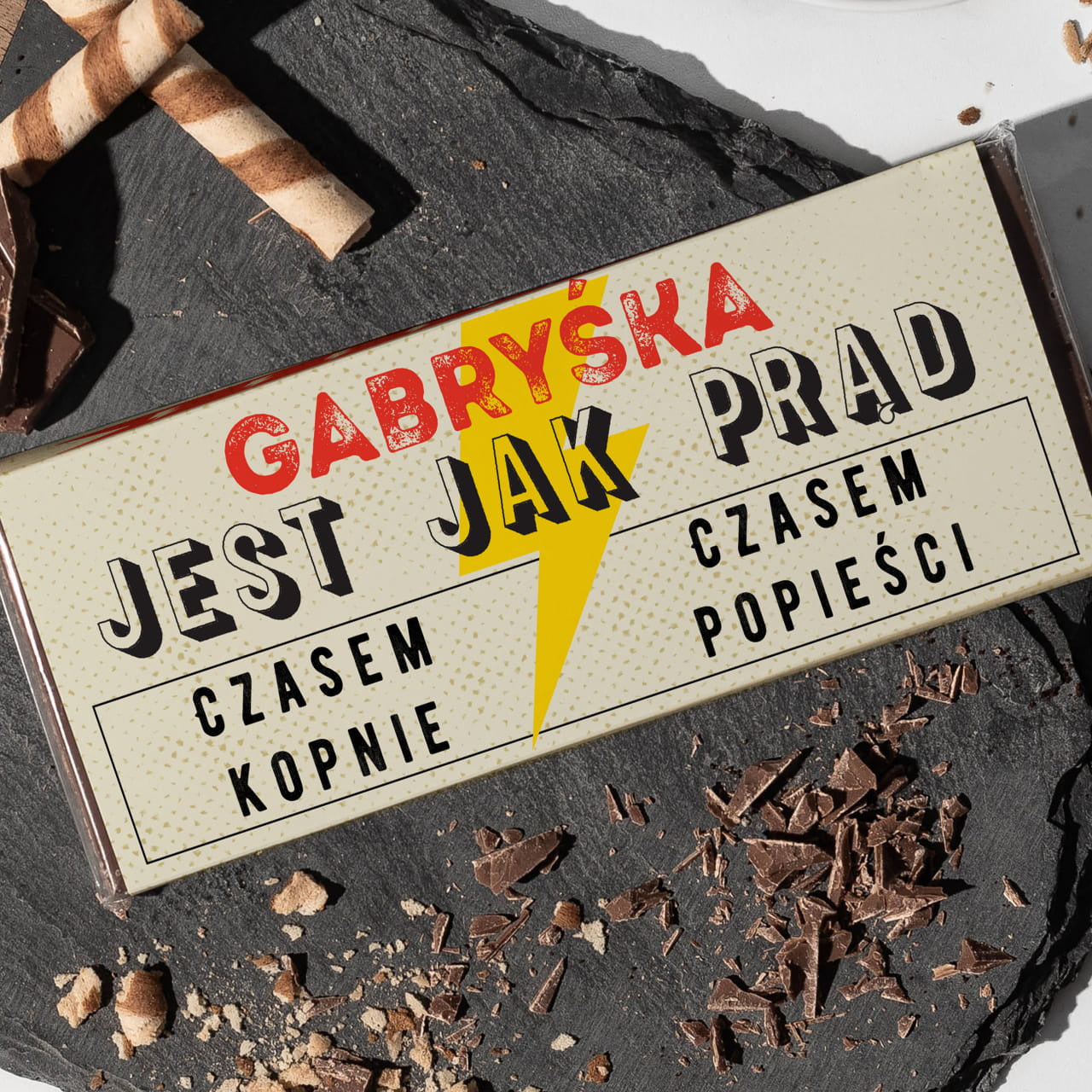 Śmieszna czekolada na Dzień Kobiet - kobieta jest jak prąd upominek na dzień kobiet belgijska czekolada